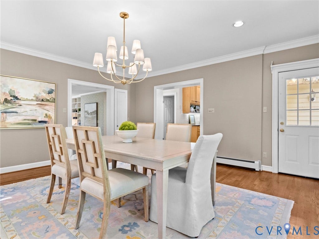 216 Ross Road, Westham Area, Henrico, VA 23229 Hardwood flooring, crown molding, and a multi-arm chandelier with fabric shades