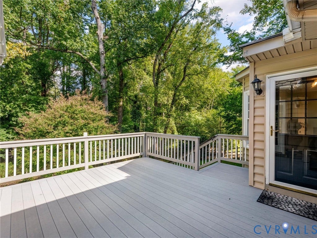 216 Ross Road, Westham Area, Henrico, VA 23229 Spacious exterior deck with composite decking, white railing, and exterior wall lantern