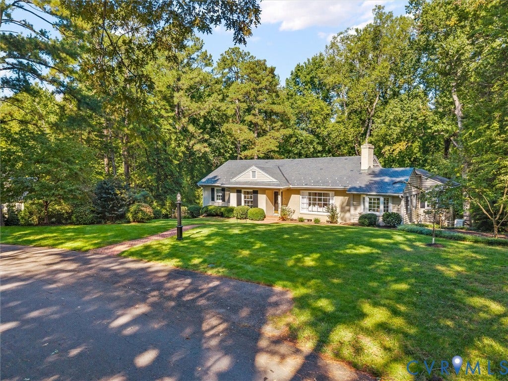 216 Ross Road, Westham Area, Henrico, VA 23229 Single-story residence featuring a gray shingle roof and a stucco and stone facade