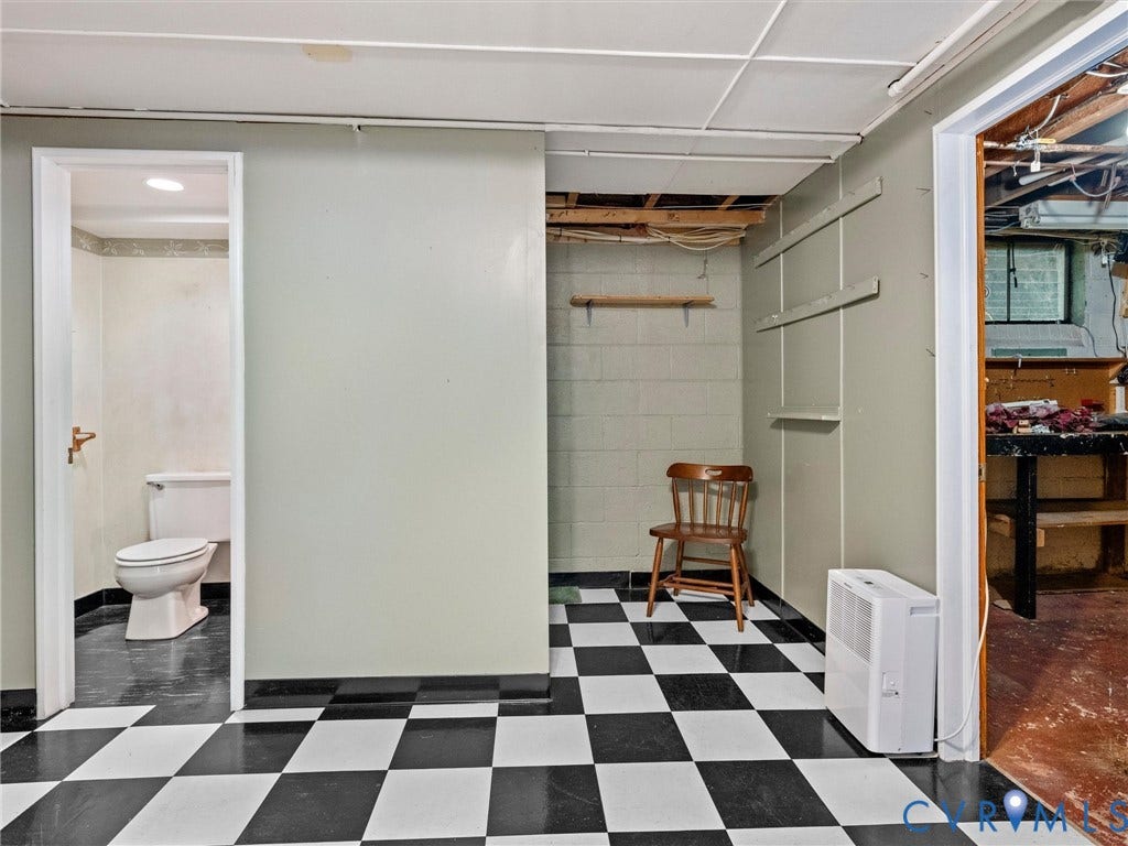 216 Ross Road, Westham Area, Henrico, VA 23229 Checkered floor tiling, drop ceiling, and a built-in toilet in a separate room