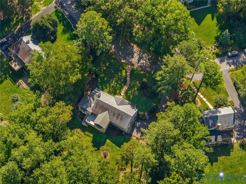 216 Ross Road, Westham Area, Henrico, VA 23229 Expansive property featuring mature trees and a substantial main residence with a multi-level roofline