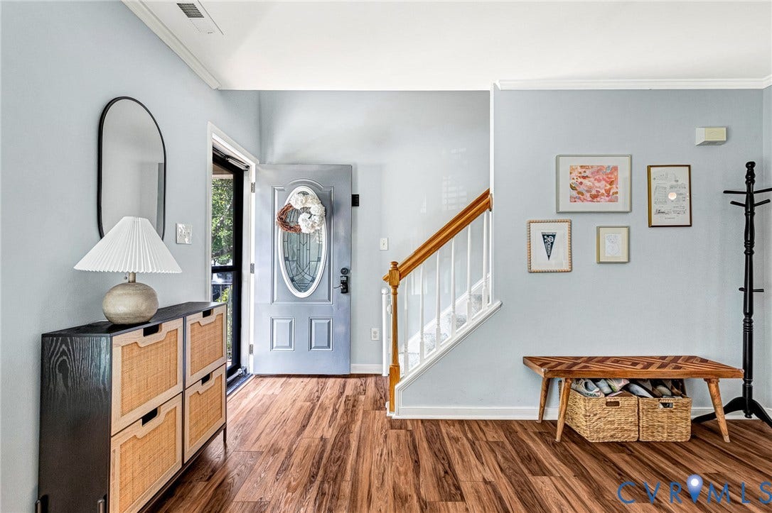 Wood-finish flooring throughout the entryway