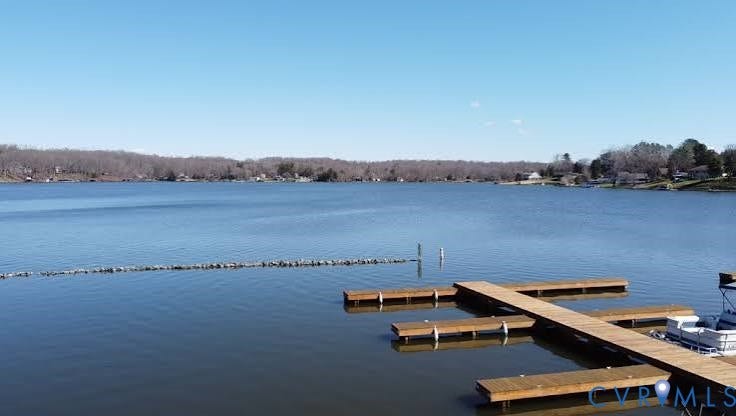 307 Poplar Dr, Louisa, VA 23093 Waterfront property featuring a private boat dock with multiple slips