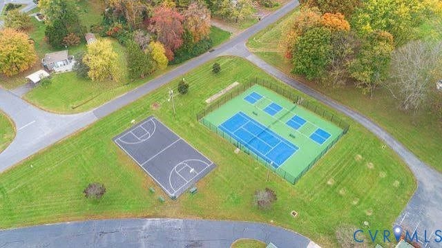 307 Poplar Dr, Louisa, VA 23093 Recreational area featuring a basketball court and a fenced court with multiple playing surfaces