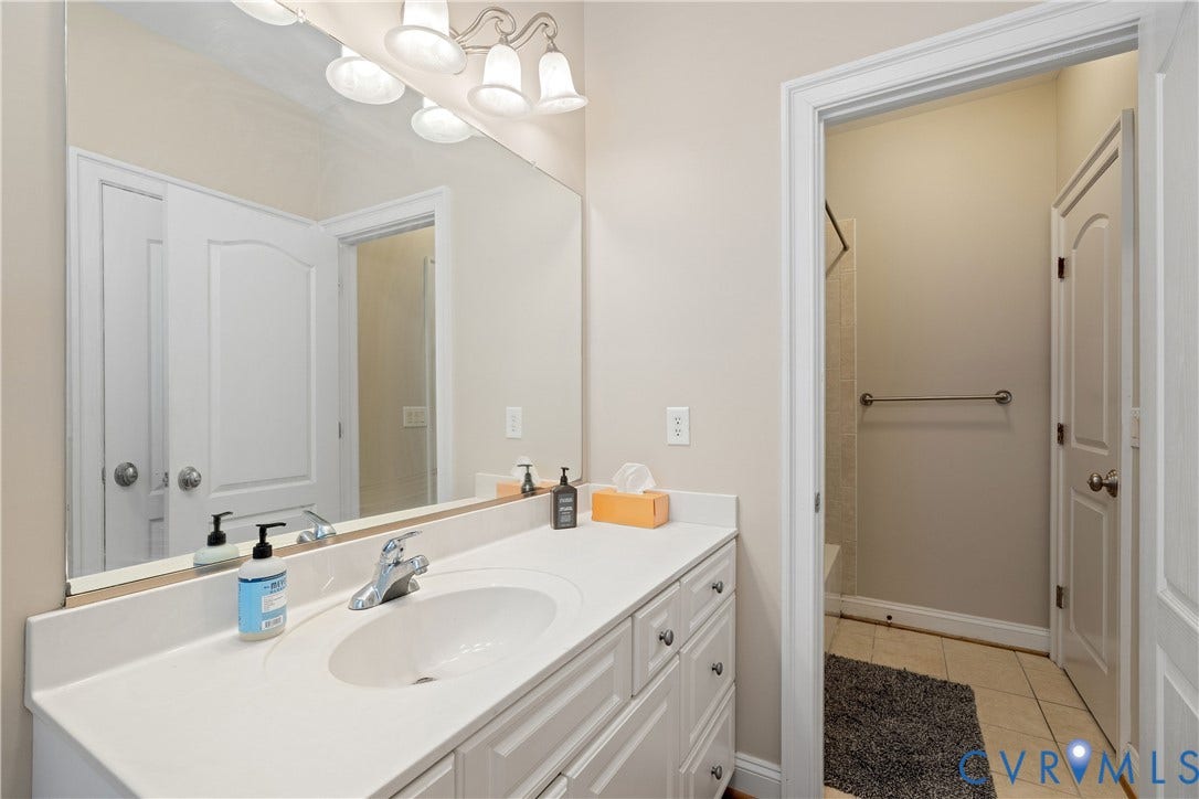1st Floor Bath (separate tub/shower area has a direct entrance from the bedroom)