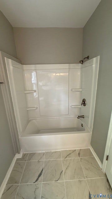 1424 Decatur Street, Rhodes Plan, Richmond, VA 23224 White tile flooring with veining, white bath and shower combination, and brushed nickel fixtures