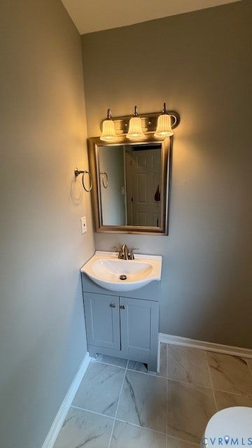 1424 Decatur Street, Rhodes Plan, Richmond, VA 23224 Recessed vanity with integrated sink, brushed nickel faucet, framed mirror, and three-light fixture