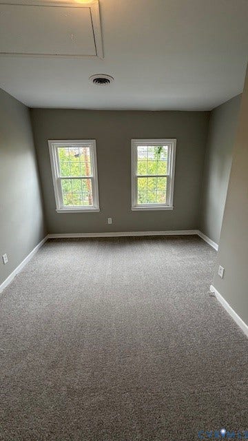 1424 Decatur Street, Rhodes Plan, Richmond, VA 23224 Neutral tone wall paint, dual windows, gray carpeting, and white trim