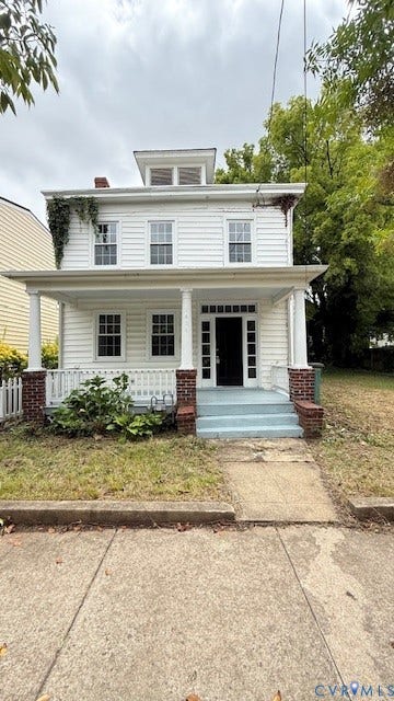 1424 Decatur Street, Rhodes Plan, Richmond, VA 23224 Two-story residence with a front porch, white siding, and a prominent cupola