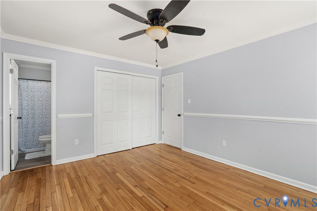 5221 Ecoff Avenue, Chester, VA 23831 Wood-finish flooring, crown molding, and chair rail detailing
