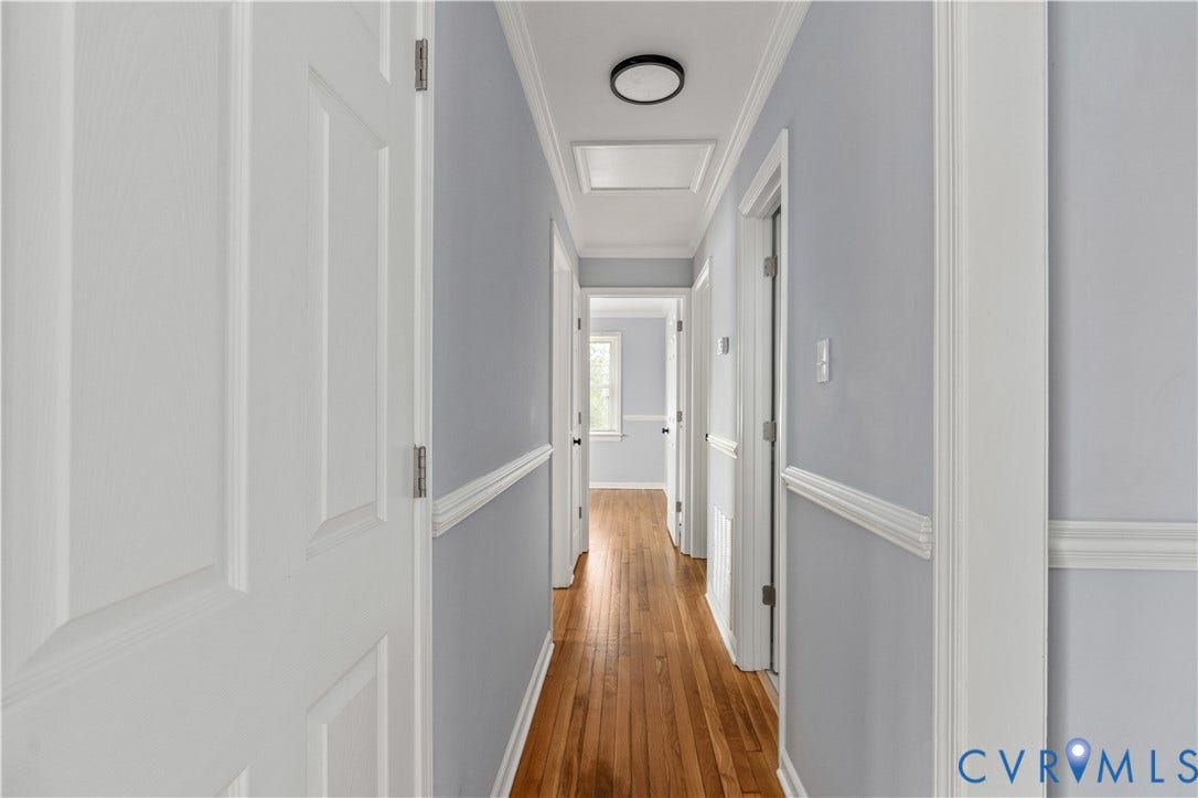 5221 Ecoff Avenue, Chester, VA 23831 Hardwood flooring throughout, crown molding, chair rail molding, panel doors, and flush mount lighting
