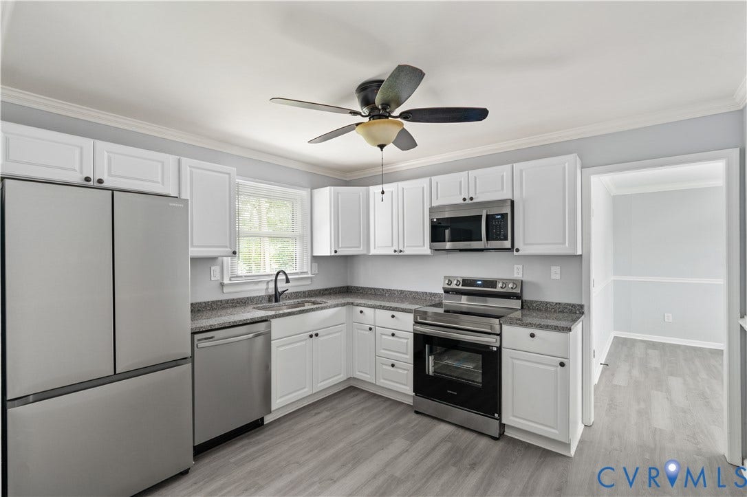 5221 Ecoff Avenue, Chester, VA 23831 Kitchen featuring white cabinetry, stainless steel appliances, granite-style countertops, wood-finish flooring, and a ceiling fan
