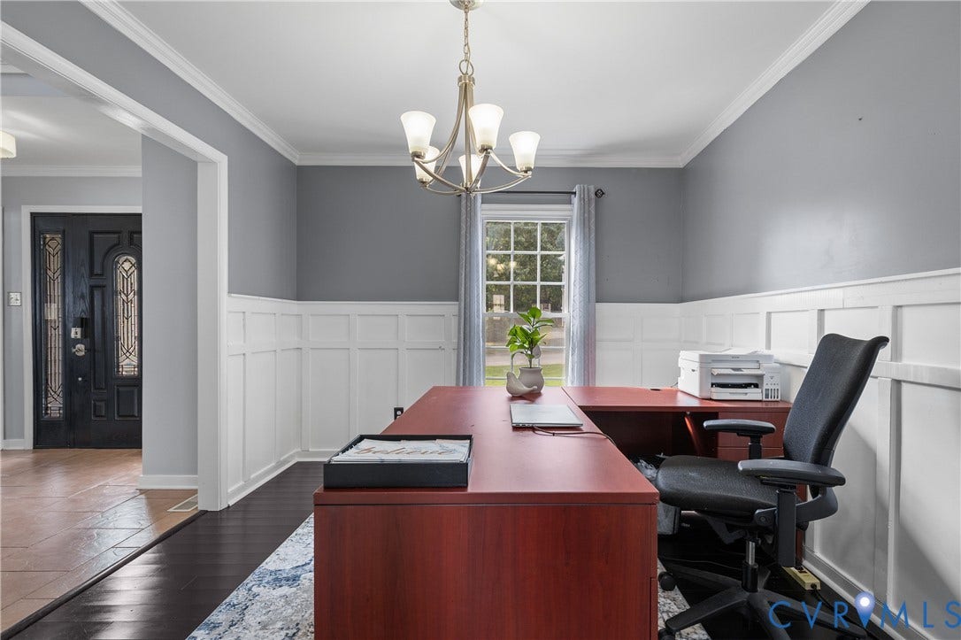 7625 Southford Lane, Chesterfield, VA 23832 Detailed wainscoting and crown molding complement the interior space