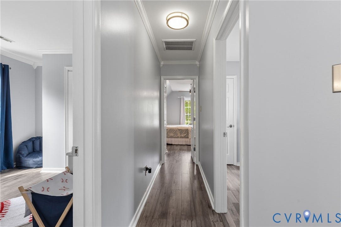 7625 Southford Lane, Chesterfield, VA 23832 Hallway featuring wood-finish flooring, crown molding, and recessed lighting