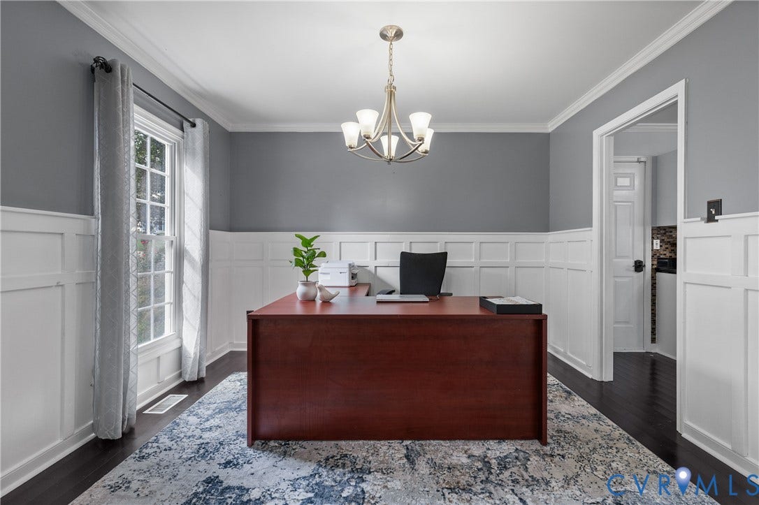 7625 Southford Lane, Chesterfield, VA 23832 Hardwood flooring, wainscoting, crown molding, and a five-light chandelier