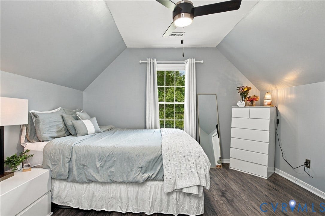 7625 Southford Lane, Chesterfield, VA 23832 Sloped ceilings, window with exterior foliage, wood-finish flooring, and a ceiling fan with integrated lighting