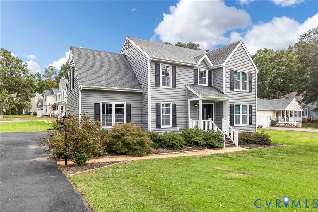 7625 Southford Lane, Chesterfield, VA 23832 Two-story home featuring gray siding, a covered front entry, and a paved driveway
