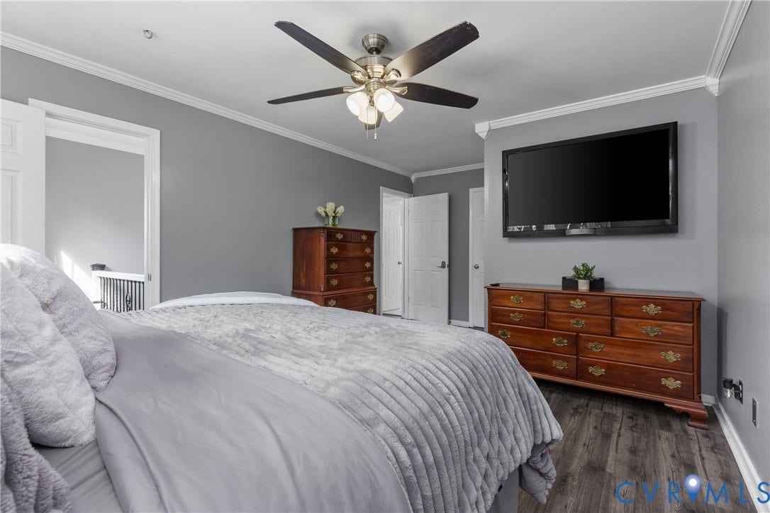 7625 Southford Lane, Chesterfield, VA 23832 Wood-finish flooring, crown molding, and a ceiling fan with integrated lighting