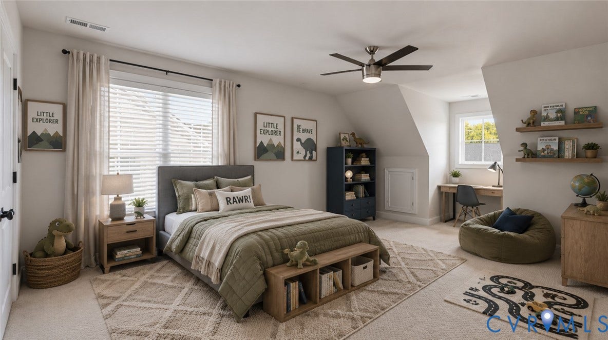 Carpeted bedroom featuring multiple windows, a ceiling fan with integrated lighting, built-in shelving, and a desk area