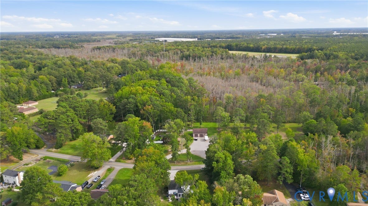 6723 Bull Hill Road, Prince George, VA 23875 Expansive wooded property with a detached garage and paved driveway