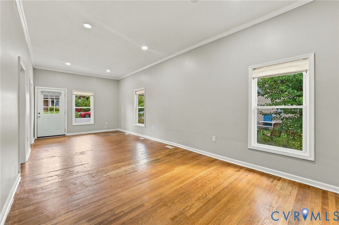 1432 Ferndale Avenue, Petersburg, VA 23803 Hardwood flooring, recessed lighting, multiple windows, and a white entry door