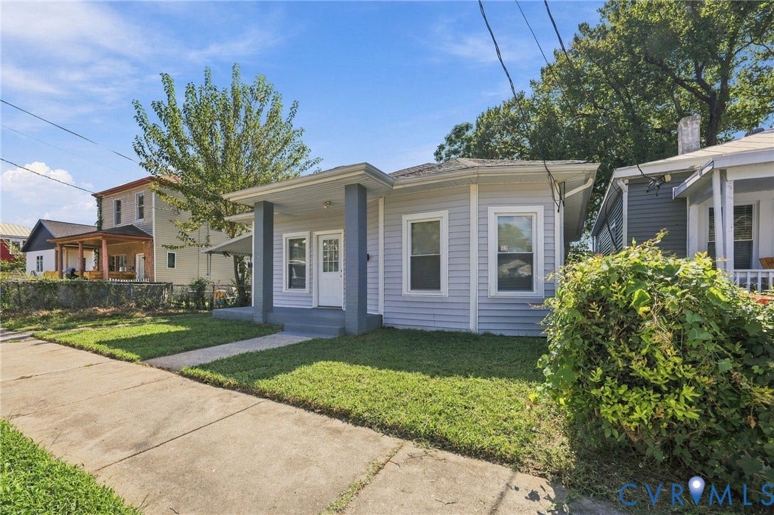 1432 Ferndale Avenue, Petersburg, VA 23803 Light-colored siding exterior with a covered front porch featuring square columns