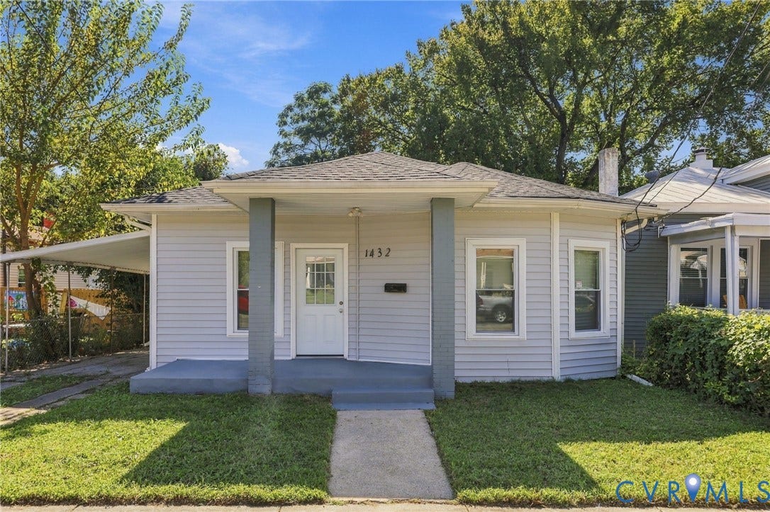 1432 Ferndale Avenue, Petersburg, VA 23803 Light gray siding exterior with a dark gray shingle roof
