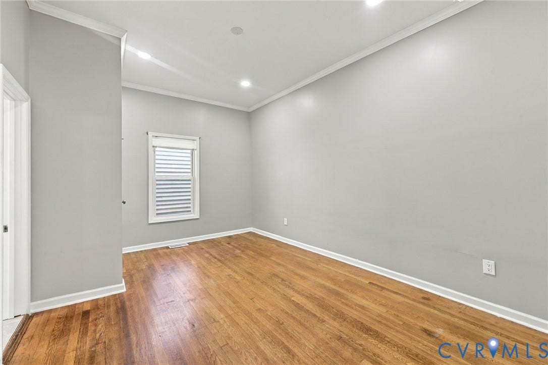 1432 Ferndale Avenue, Petersburg, VA 23803 Hardwood flooring, recessed lighting, crown molding, a window with blinds, and a white interior door