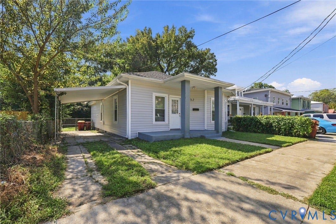 1432 Ferndale Avenue, Petersburg, VA 23803 Siding exterior with a covered front porch, carport, and concrete driveway