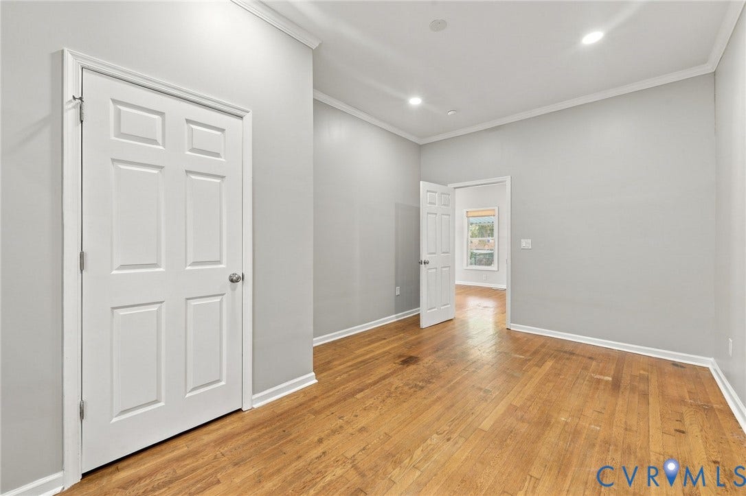1432 Ferndale Avenue, Petersburg, VA 23803 Wood-finish flooring, recessed lighting, crown molding, and white trim accents