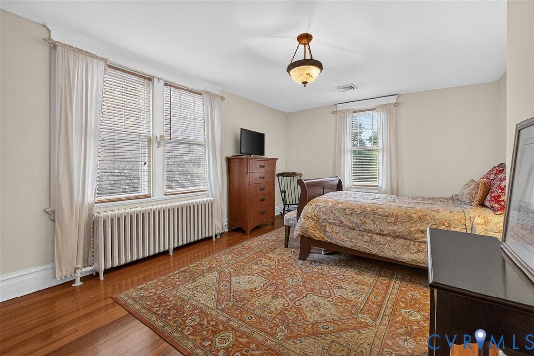 3812 Fauquier Avenue, Bellevue, Richmond, VA 23227 Hardwood flooring, painted walls, and ceiling-mounted light fixture