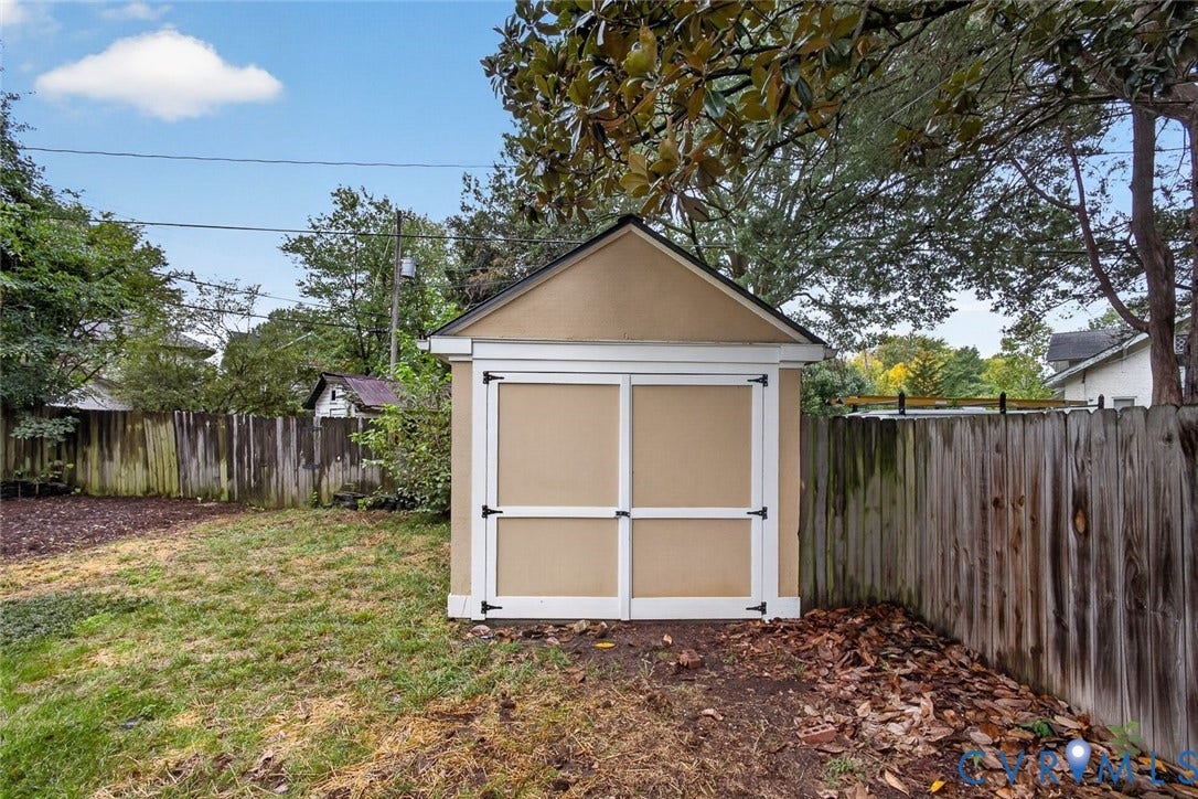 3812 Fauquier Avenue, Bellevue, Richmond, VA 23227 Detached shed with an A-frame metal roof, gutters, and double doors. Would make a wonderful shop!