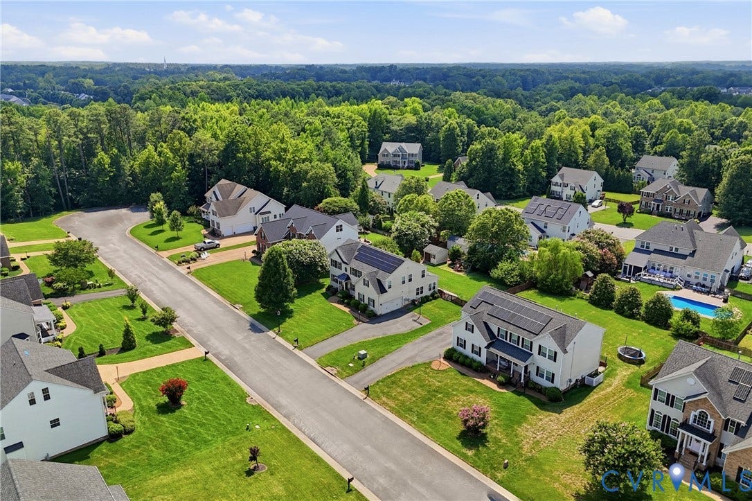 3536 Hunton Ridge Drive, Glen Allen, VA 23059 Residential community featuring paved streets, manicured lawns, mature trees, and a swimming pool