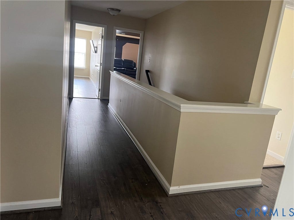3536 Hunton Ridge Drive, Glen Allen, VA 23059 Corridor featuring wood-finish flooring, light neutral wall tones, and white trim