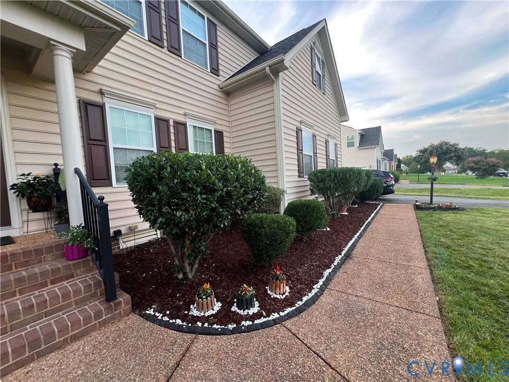 3536 Hunton Ridge Drive, Glen Allen, VA 23059 Siding exterior with shuttered windows, brick steps, and a decorative column