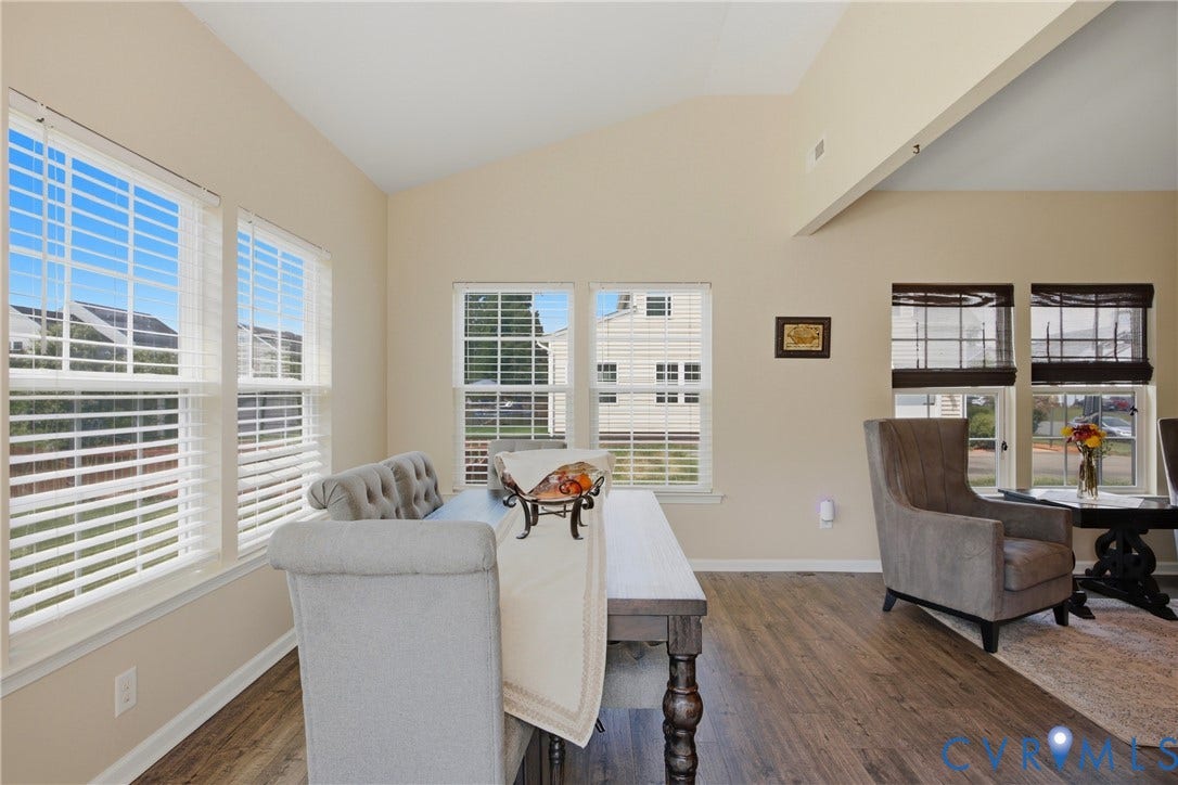3536 Hunton Ridge Drive, Glen Allen, VA 23059 Vaulted ceilings, wood-finish flooring, and multiple windows with blinds