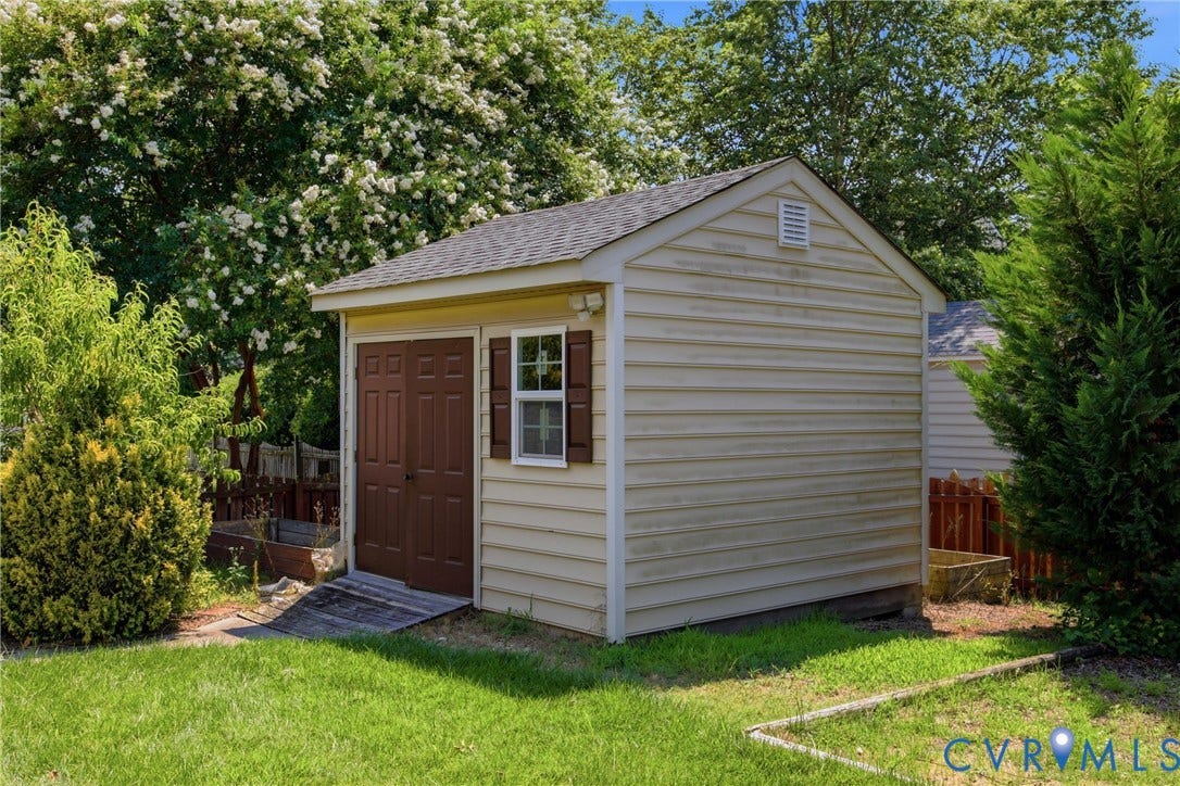 3536 Hunton Ridge Drive, Glen Allen, VA 23059 Detached storage shed featuring horizontal siding, a gabled roof, and brown double doors