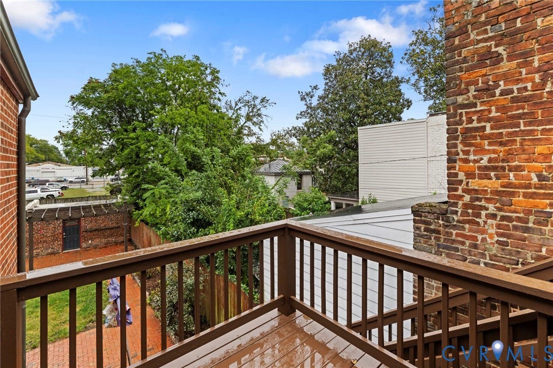 2714 E Broad Street, Church Hill, Richmond, VA 23223 Deck with wood railing and plank flooring