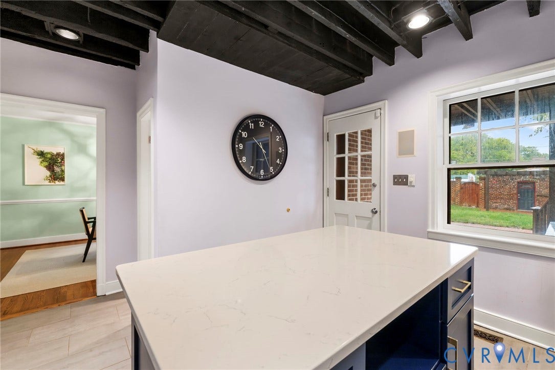 2714 E Broad Street, Church Hill, Richmond, VA 23223 Kitchen island featuring a light-toned countertop