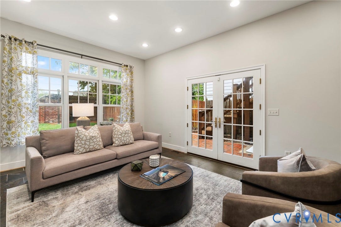 2714 E Broad Street, Church Hill, Richmond, VA 23223 Recessed lighting, large multi-pane windows, French doors, dark tile flooring, and light wall finishes