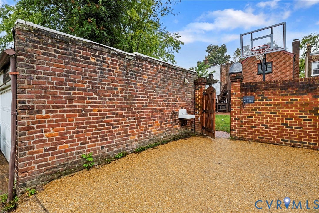 2714 E Broad Street, Church Hill, Richmond, VA 23223 Brick privacy walls with integrated wooden gate