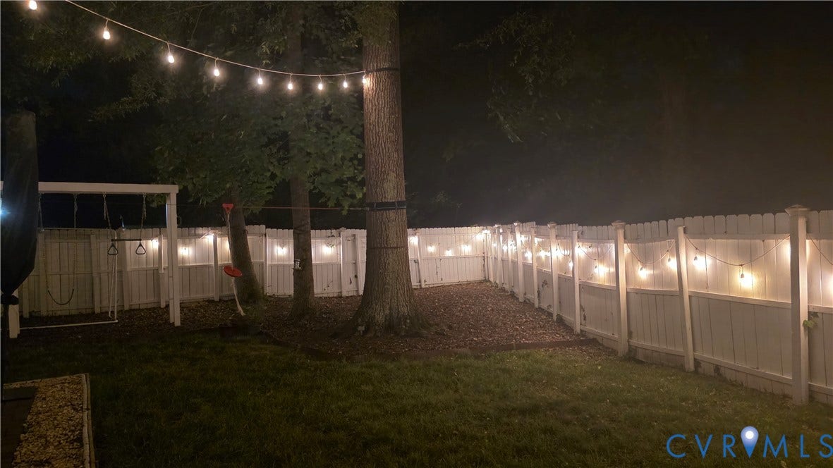 9516 Hungary Woods Drive, Henrico, VA 23060 String lights around the fence for evening gatherings