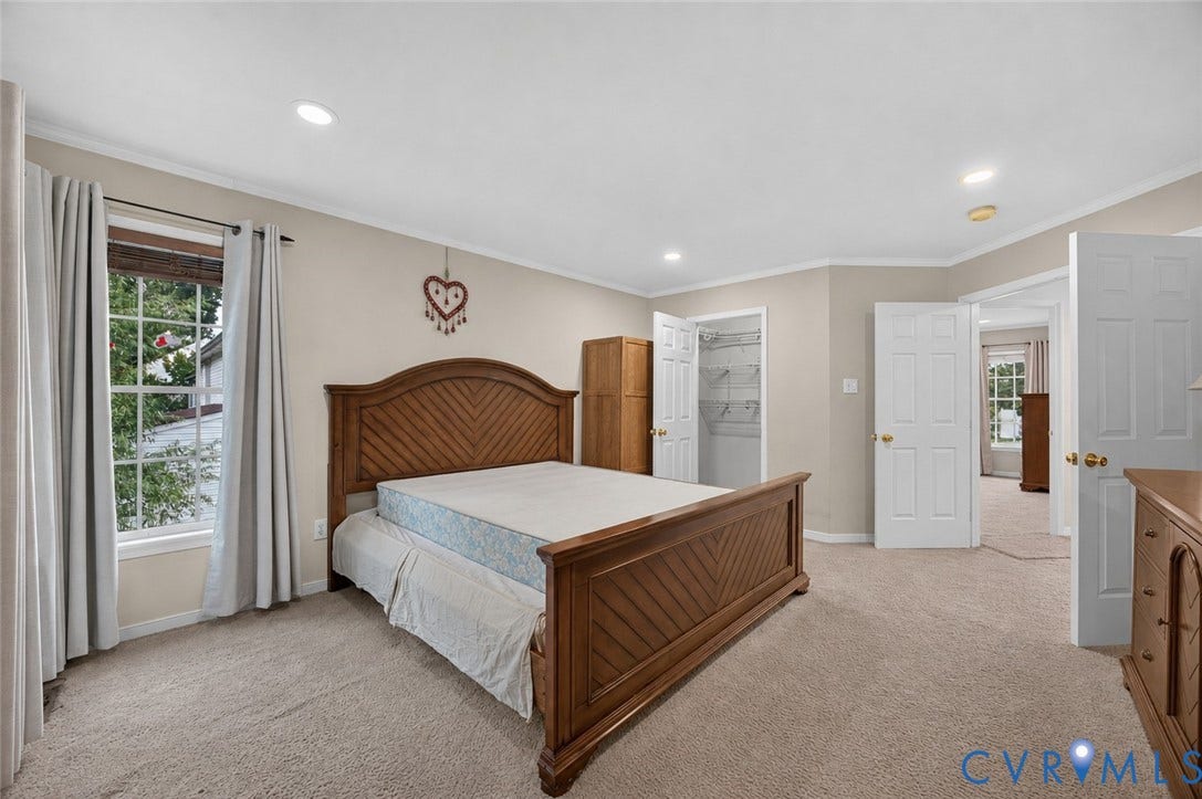 9516 Hungary Woods Drive, Henrico, VA 23060 Recessed lighting, crown molding, double-door closet, and carpeted flooring