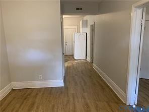 3119-A 4th Avenue, Richmond, VA 23222 Wood-finish flooring with white trim, light gray painted walls
