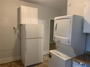 3119-A 4th Avenue, Richmond, VA 23222 White refrigerator and a stacked washer and dryer unit