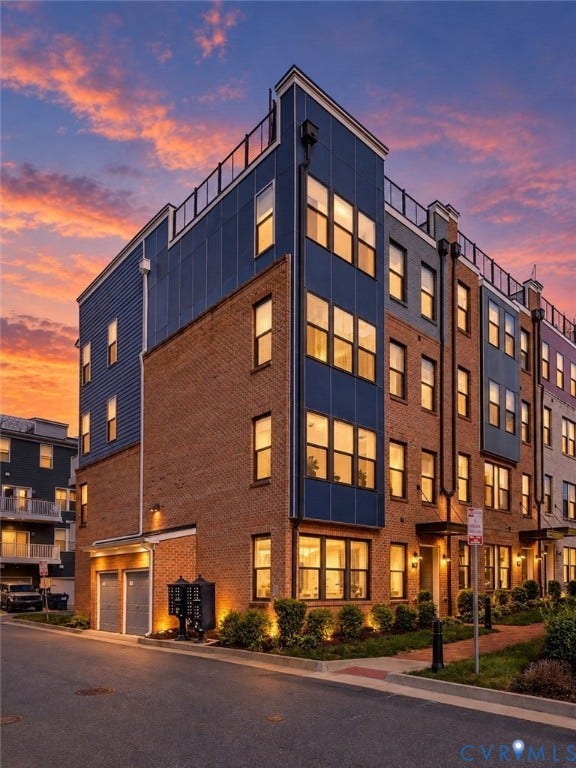 2 Flatwater Row, #B, Rocketts Landing, Henrico, VA 23231 Multi-level townhome featuring brick and panel siding