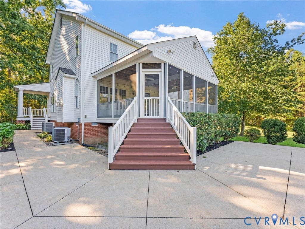 2354 Camelback Road, Maidens, VA 23102 Rear view of home with 2 patio areas
