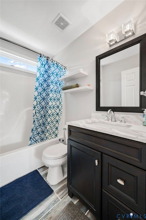 10808 Pruett Lane, Henrico, VA 23059 Vanity with dark wood cabinetry, white countertop, and rectangular mirror