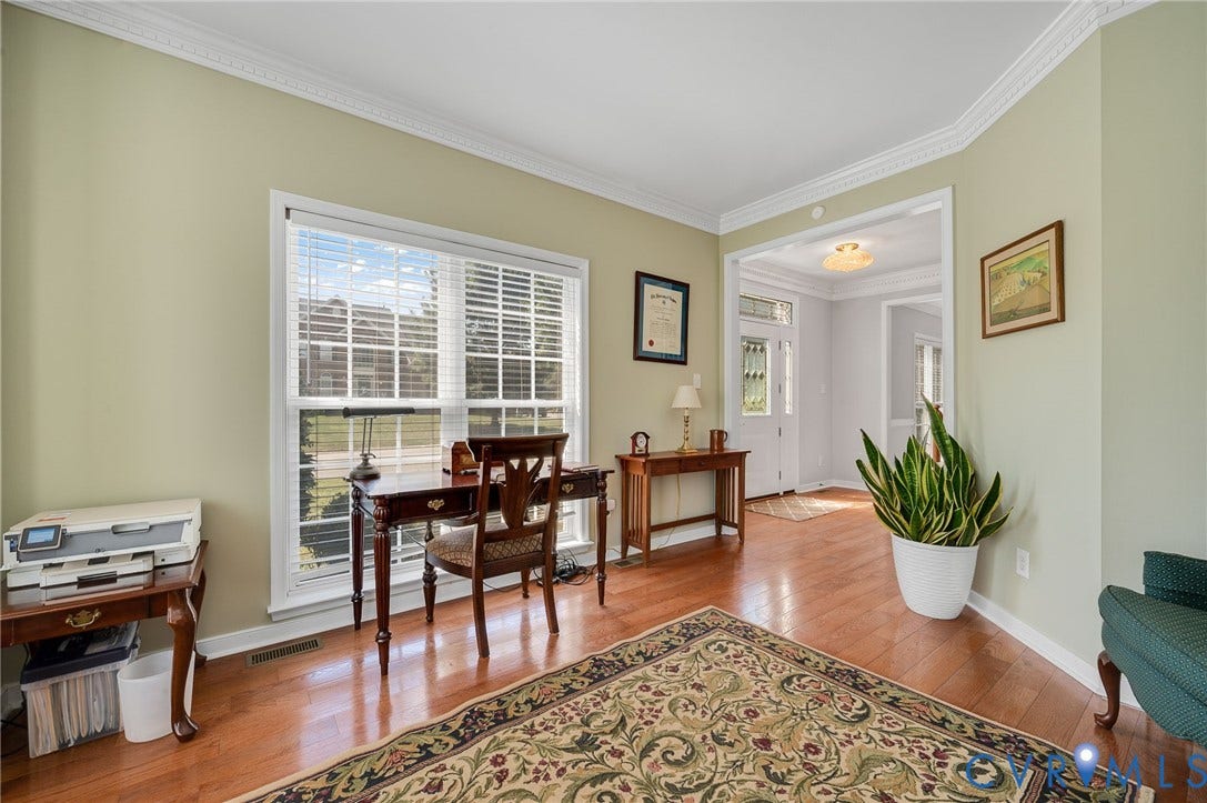 10808 Pruett Lane, Henrico, VA 23059 Hardwood flooring, crown molding, large window, and broad arched entryway