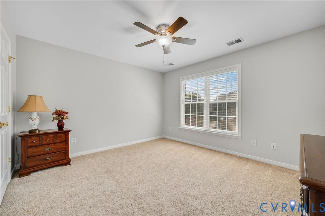 10808 Pruett Lane, Henrico, VA 23059 Carpeted flooring, a ceiling fan with integrated lighting, window with blinds, and white trim molding